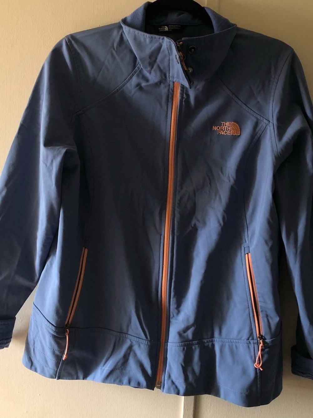 The North Face Women's blue Jacket with Orange/pinkish Trim